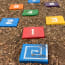 a colorful square blocks with numbers painted on the ground
