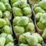 a group of baskets of pears