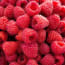 a pile of raspberries