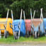 a group of wheelbarrows in a row