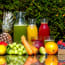 a group of juices and fruits