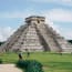 a pyramid in a grassy area