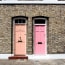 two doors in a brick building