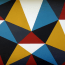 a colorful triangle pattern on a surface