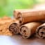 cinnamon sticks and powder on a table