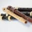 a group of flutes on a white background