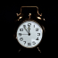 a clock with bells on it