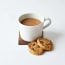 a cup of coffee and cookies