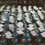 a group of graduates in blue caps