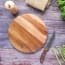 a cutting board and knife on a table