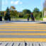 a person walking on a crosswalk