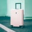 a pink suitcase on wheels