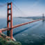 Golden Gate Bridge over water with cars on it