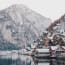 a mountain and a lake with houses