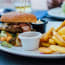 a plate of food with a burger and fries