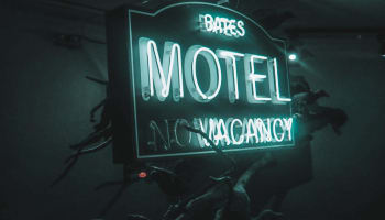 a neon sign with text