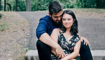 people sitting on stone steps