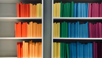 a shelf with many books