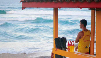 a person standing on a beach