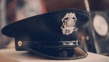 a black hat with a silver star on it
