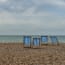 a group of chairs on a beach