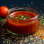 a glass jar of tomato sauce