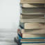 a stack of books on a table