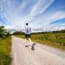 a person running on a dirt road