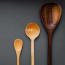 wooden spoons on a gray surface