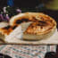 a pie on a cutting board