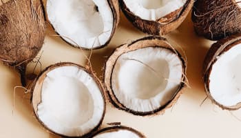 a group of coconuts on a table