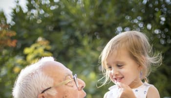 a person holding a child
