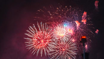 fireworks in the sky over a city