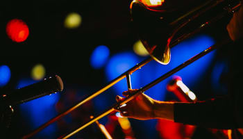 a person playing a trombone