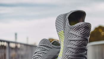 a pair of grey shoes