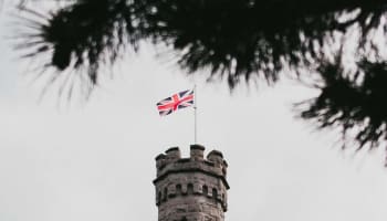 a flag on top of a tower