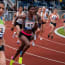 a group of people running on a track