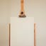 a painting stand with a white board