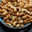 a bowl of cashews with salt and rosemary