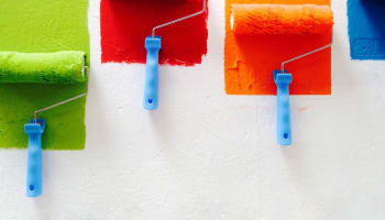 paint rollers on a wall