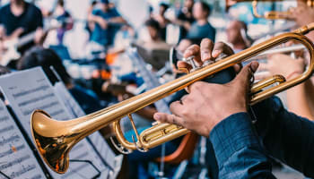 a person playing a trumpet