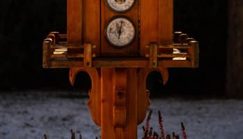 a wooden structure with a couple of gauges