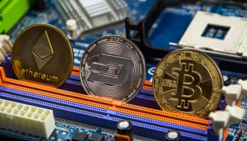 a group of coins on a circuit board