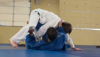 a group of men wrestling