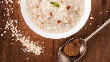 a bowl of oatmeal with herbs