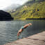 a person diving into a lake