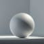 a white sphere in a corner