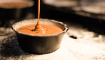 a bowl of brown liquid