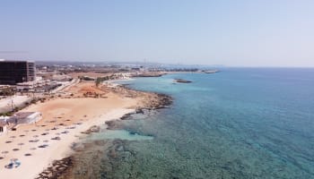 a beach with a body of water