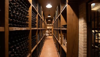 a wine cellar with many shelves